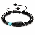Detail of Capricorn obsidian beaded bracelet with turquoise stone and adjustable cord - Capricorn