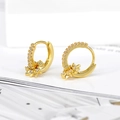 Orecchini a cerchio dorati in stile francese con pendenti a stella e pietre zirconi - Oro