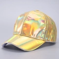 Detailed macro shot of a golden holographic laser baseball cap with metallic finish - Curved Brim / Gold