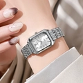 Elegant silver square quartz watch with multi-link steel strap worn on a female wrist - Silver White Face