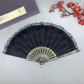 Elegant black lace folding fan with gold patterned ribs and Chinese style book decoration - Double Layer Black Lace Fan - Without Tassel