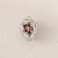 Detailed close-up of a silver strawberry charm pendant set with sparkling red zircons - Silver (Strawberry)