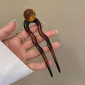 U-shaped hair pin featuring an amber transparent bead and dark reddish-brown resin body - Amber Ball Decor / Caramel Brown U-Shaped Hairpin