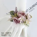 Muted pink-purple rose wrist corsage with green leaves and white ribbon for weddings - Wrist Corsage / Nude Pink