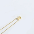 Minimalist golden clavicle necklace featuring a polished 3D letter M pendant charm - Letter Z