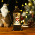 Retro bronze Christmas lantern with snowman and evergreen tree glowing on wood surface - Bronze Lantern Snowman (No Water)