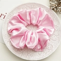 Elegant large pink satin scrunchie with high-gloss finish on a white ceramic plate - Large Light Pink