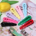 Set di 8 mollette per capelli ondulate senza cuciture in finitura lucida e colori vivaci - Multicolore
