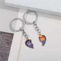 Détail de porte-clés couple en métal avec pendentifs magnétiques en forme de cœur assortis - Ours Baleine Assorti / Bleu/Argent
