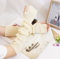 Beige 50cm long knitted arm warmers in soft ribbed fabric for women in winter style - One Size / Off White