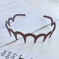 Brown wavy toothed headband in a minimalist style for comfortable hair styling - Coffee (Wave Lacquered)