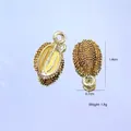 Makro-Detail von durianförmigen Goldlegierungsanhängern für DIY-Schmuck mit 1,8 g Gewicht - Durian