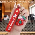 Christmas keychain with red boot pendant and silicone hand strap on golden metal ring - Christmas Stocking-1