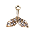 Detailed close-up of a golden fish tail pendant with sparkling zircon rhinestones - Gold Fish Tail