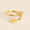 Minimalist gold open ring featuring a stylish letter M and a polished heart charm - M
