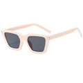 Vintage oversized square sunglasses with cream frame and black lenses from 45-degree angle - Beige