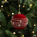 8cm burgundy flocked Christmas ball ornament with gold glitter stars hanging on tree - Beaded Wrap