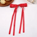 Elegant red satin ribbon bow hair clip for women, shown on a clean white background - Red