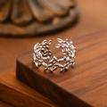 Adjustable silver stainless steel ring featuring an elegant olive leaf openwork design - Laurel Leaf / Steel