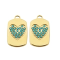 Detailed view of rectangular gold pendants with turquoise bead heart patterns - Cyan Blue
