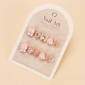 Detail of pink My Melody press-on nails with heart rhinestones and pearls on display card - By1735 / Glue Type