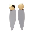 Modern gold-plated earrings with matte grey teardrop resin pendants on white background - Gray