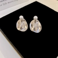 Silver textured irregular round earrings with elegant white pearl backings on black velvet - 64# Silver Earring Post - Silver Irregular Round Disc White Pearl Stopper