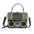 Vintage radio-style acrylic handbag in glossy black with golden metallic hardware - Black