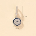 Evil eye round pendant with blue crystals and silver base, dimensions 2.7cm by 1.2cm - Silver Slim Evil Eye Blue Border Round Pendant (17-10)