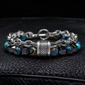 Detail of double-layer men's bracelet with blue malachite beads and silver steel chain - 21cm / Blue