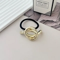 Elastic black hair tie with geometric knotted gold metal ornament and metallic finish - Style G Light Gold