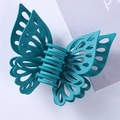 Detail of teal matte butterfly hair claw clip with intricate hollowed-out wing design - 15CM / Cyan