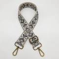 Detail of adjustable floral embroidery bag strap with vintage brass swivel hooks and buckle - Beige Grey Black Bronze Hook