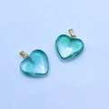 Set of two transparent green heart-shaped glass pendants with elegant gold line patterns - Emerald Green