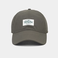 Close-up of olive green quick-dry baseball cap with laser-cut holes and Paradise patch - Adjustable / Army Green