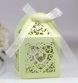 Detail of laser-cut heart pattern on mint green wedding favors box with ribbon bow - Light Green
