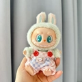 Labubu doll in green rabbit plush hood and pink plaid overalls with cat embroidery - Pink And White Checkered Overalls / First And Second Generation Keychains Are Compatible With La Cloth Dolls. Dolls Not Included.