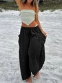 Detail of black striped straight-leg pants with elastic waist and large cargo pockets - S / Black