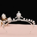 Close-up of vintage silver bridal crown with white pearls and sparkling rhinestones - No.3 Silver (White Stone)