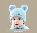 Sky blue knit baby winter hat and scarf set with cute pom-poms and eyelash embroidery - Squinting Set Blue (2 Months - 2 Years)