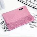 Pink cashmere feel scarf with fringe and label in a stylish still life display - 70*200cm / Leather Red