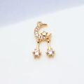 Close-up of gold-plated star and moon pendant with shimmering cubic zirconia stones - Style 04# Delicate Moon