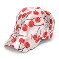 Pink satin baseball cap with detailed red cherry embroidery in a 45-degree side view - Lotus Pink