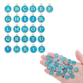 Macro detail of sky blue enamel alphabet charms with gold frames for DIY jewelry making - A-Z Set (26Pcs) / Blue