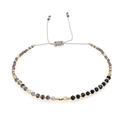 Detail of adjustable woven cord bracelet with black, gray, and gold minimalist seed beads - Black Grey Gold Mixed
