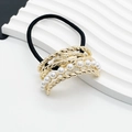 Detailed view of elastic hair tie featuring gold alloy twist decor and faux pearls - Large / Gold