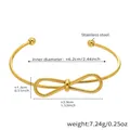 Detailweergave van de 18k vergulde strikarmband van roestvrij staal met afmetingen - Strik Open Armband / Goud