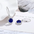 Halo design oval dark blue sapphire drop earrings with silver finish and white diamonds - Sapphire Blue Diamond Four-prong Round Earrings Led-98