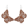 Detailed close-up of butterfly wood earrings with intricate hollow-carved patterns - Style 57