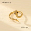Macro detail of golden snake ring with black gemstone eyes and scaled texture weighing 2.2g - Ring-Open-Black Zircon